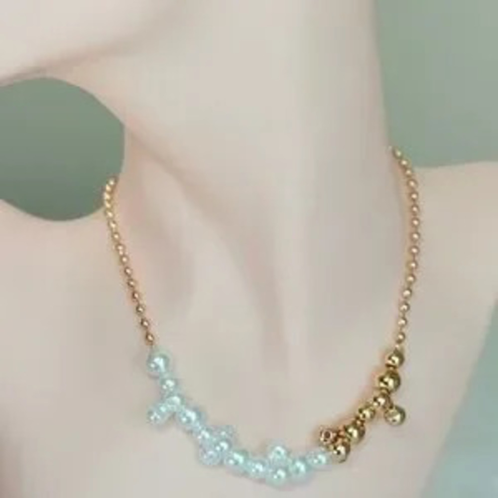 Gold and White Beaded Necklace